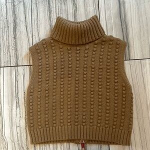 Zara Shell sweater with gold zipper on back.